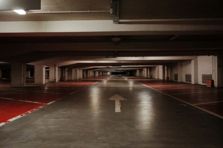 Smooth sealed concrete floor in an underground garage, the kind of surface an epoxy coating protects