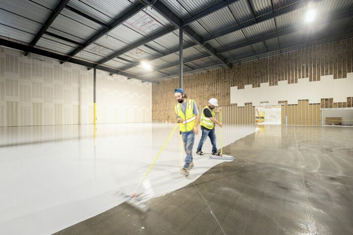 Seamless glossy coated concrete floor showing the finish of a two-part coating compared with epoxy floor paint