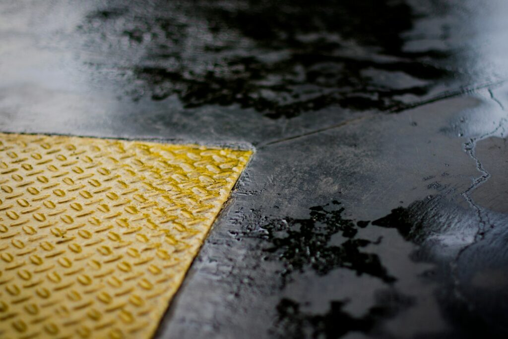 Smooth sealed concrete floor of the kind a garage floor epoxy kit is used to coat