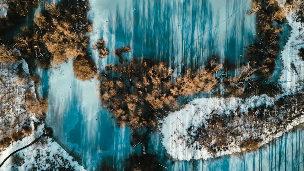 Flowing blue and brown pattern resembling the resin river and timber of river tables for sale