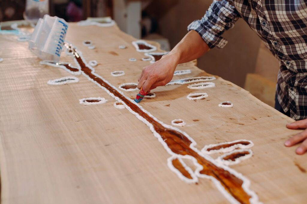 Pouring a clear flood coat while learning how to epoxy a table top