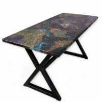 Close-up of fibre optic stars in a nebula resin table